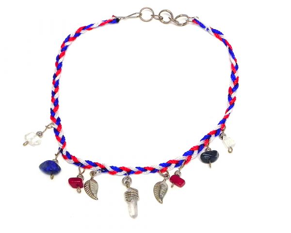 Braided macramé thread anklet with natural clear quartz crystal, chip stones, and silver metal leaf charm dangles in American flag USA colors.
