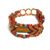 Handmade thick woven braided macramé wide strap bracelet with Czech glass seed beads and crystal beads in turquoise mint, red, and golden yellow color combination.