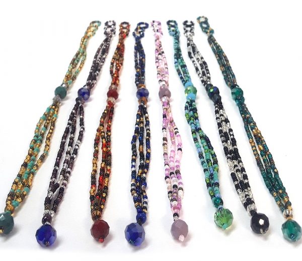 Czech glass seed bead multi strand bracelet with triple crystal bead centerpiece.