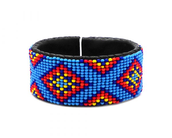 Handmade Native American inspired Czech glass seed bead black leather cuff bracelet with tribal fire diamond pattern design in light blue, blue, red, orange, and yellow color combination.