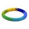Handmade Czech glass seed bead bangle bracelet with multicolored pattern design in blue, light blue, turquoise, green, lime green, and yellow color combination.