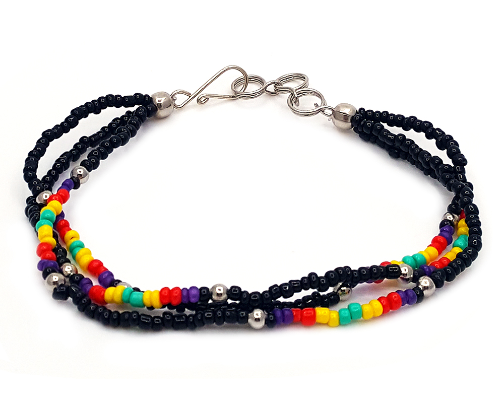 Handmade Native American inspired seed bead multi strand bracelet in black, dark purple, red, yellow, and mint green color combination.