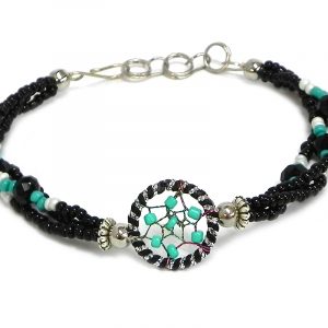 Handmade seed bead and crystal bead multi strand bracelet with round beaded sparkle thread dream catcher centerpiece in black, mint green, and white color combination.