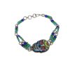 Handmade seed bead silver metal chain bracelet with acrylic Day of the Dead faded sugar skull centerpiece in blue, turquoise, lime green, red, black, and white color combination.