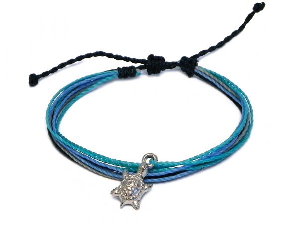 Handmade multicolored multi strand string pull tie bracelet with silver metal sea turtle charm dangle in black, light blue, turquoise, and gray color combination.