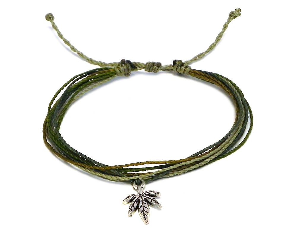 Handmade multicolored multi strand string pull tie bracelet with silver metal cannabis pot leaf charm dangle in olive green and pale green color combination.