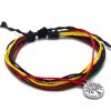 Handmade multicolored multi strand string pull tie bracelet with round silver metal tree of life charm dangle in Rasta colors.