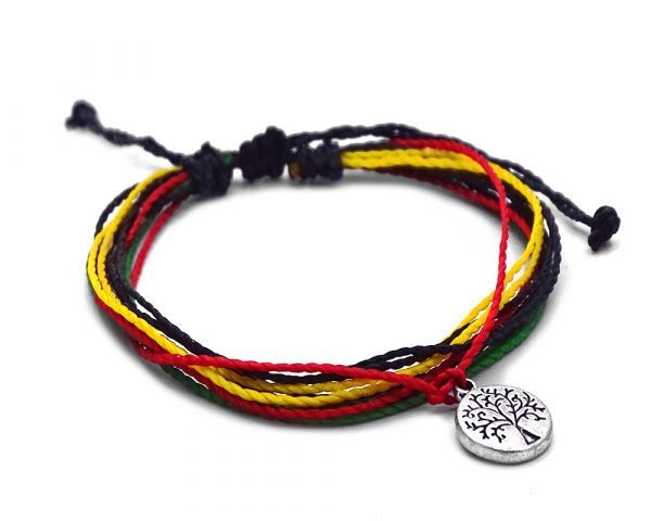 Handmade multicolored multi strand string pull tie bracelet with round silver metal tree of life charm dangle in Rasta colors.