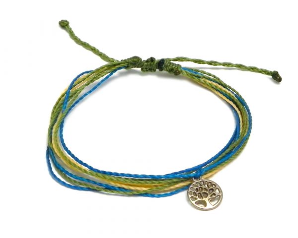 Handmade multicolored multi strand string pull tie bracelet with round silver metal tree of life charm dangle in olive green, turquoise blue, and beige color combination.