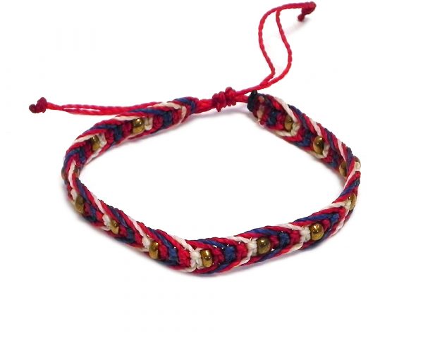 Handmade multicolored macramé braided string pull tie bracelet with gold-colored seed beads in USA American flag color combination.