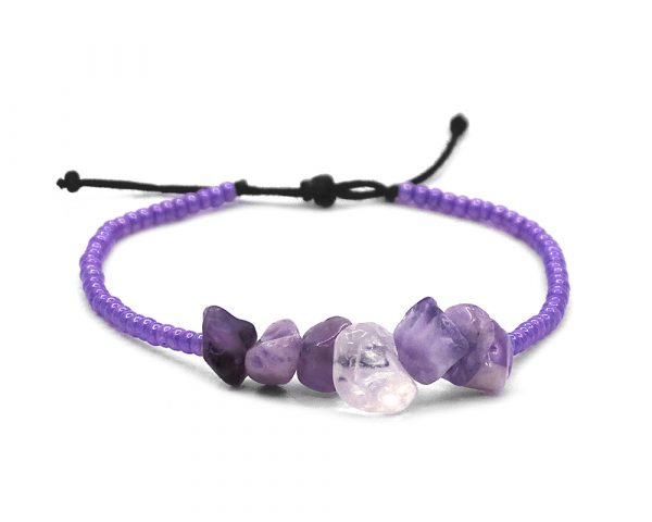 Handmade beaded bracelet with chip stone centerpiece, seed beads, and pull tie closure in purple and lavender color combination.