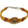 Handmade braided dyed leather bracelet with brown resin, mixed metal spiral design, and mini round teal green chrysocolla stone cabochon centerpiece in golden yellow-orange color.