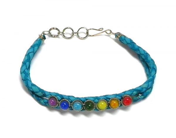 Handmade braided dyed leather bracelet with 7 chakra rainbow-colored beaded centerpiece in turquoise color.