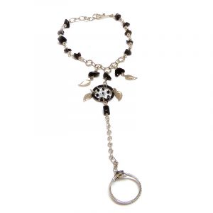 Handmade alpaca silver metal chain harem bracelet with round thread dream catcher, chip stones, and metal leaf charm dangles, linked to mini round stone ring in black color.