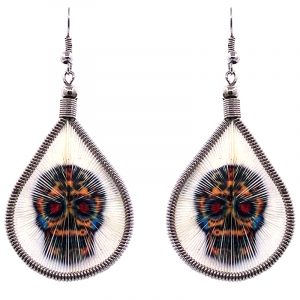 Teardrop-shaped thread dangle earrings with alpaca silver wire and Day of the Dead sugar skull graphic image in white, golden yellow, and multicolored color combination.