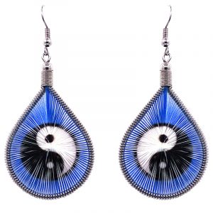 Teardrop-shaped thread dangle earrings with alpaca silver wire and black and white yin yang graphic image in blue color.