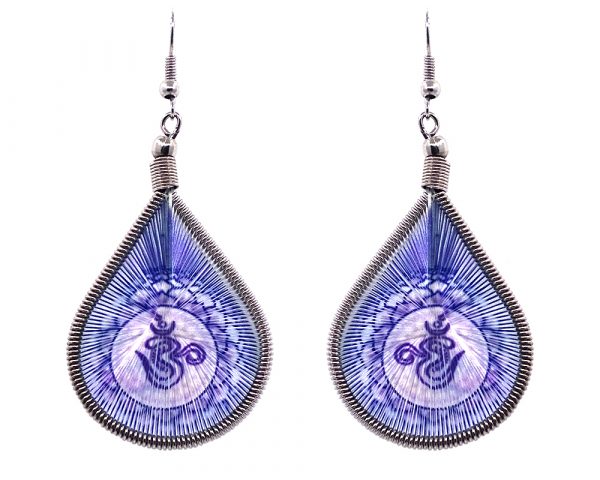 Teardrop-shaped thread dangle earrings with alpaca silver wire and om sign graphic image in blue and white color combination.