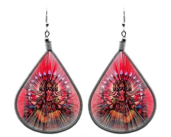 Large teardrop thread earrings with alpaca silver wire and graphic image in red and multicolored color combination.