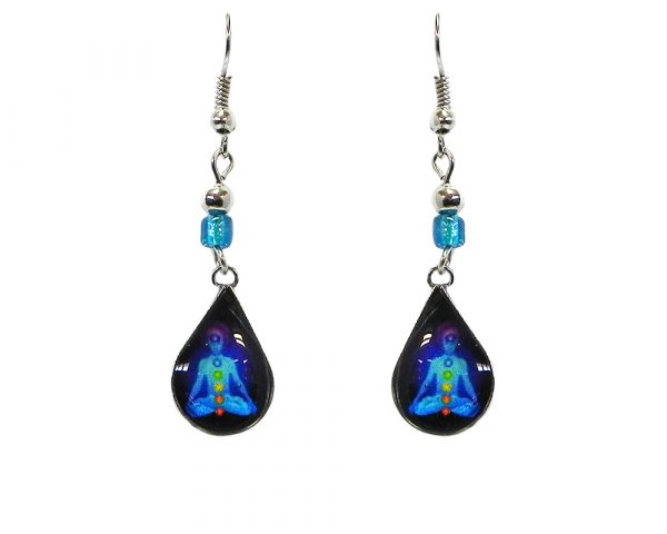 Mini teardrop-shaped New Age themed chakra graphic acrylic dangle earrings with silver metal setting and beaded metal hooks in turquoise, navy blue, and rainbow color combination.