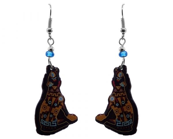 Tribal pattern howling coyote acrylic dangle earrings with beaded metal hooks in golden yellow, black, and light blue color combination.