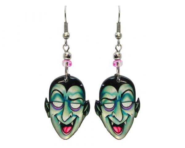 Halloween themed Dracula vampire face acrylic dangle earrings with beaded metal hooks in mint, purple, pink, and black.