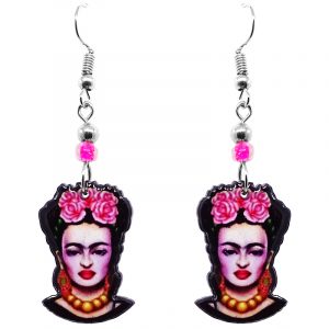 Handmade Frida inspired face earrings with acrylic, seed beads, and metal hooks in hot pink, light pink, black, and gold color combination.