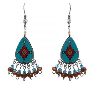 Handmade teardrop-shaped ceramic earrings with handpainted tribal pattern design and short seed bead and alpaca silver metal dangles in teal green, red, turquoise, and brown color combination.
