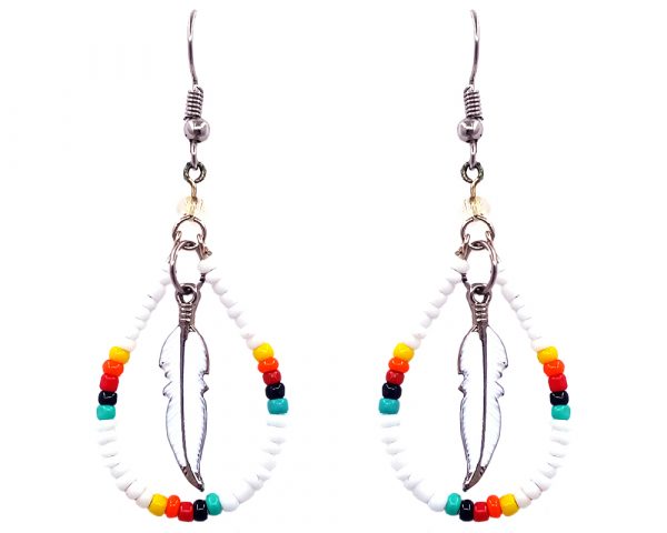 Handmade Native American inspired teardrop-shaped seed bead hoop earrings with colored metal feather charm inner dangle in white, yellow, orange, red, black, and mint green color combination.