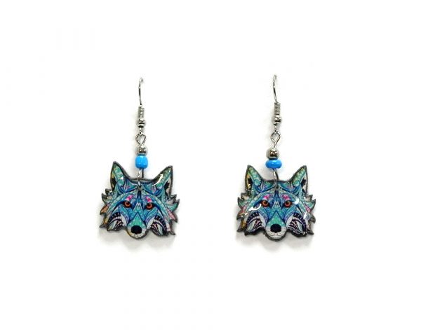 Tribal pattern wolf face acrylic dangle earrings with beaded metal hooks in light blue, turquoise, dark blue, white, and hot pink color combination.