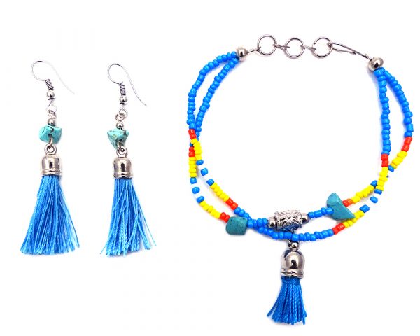 Handmade Native American inspired seed bead multi strand bracelet with silk thread tassel dangle and matching tassel earrings with chip stones in turquoise blue, orange, yellow, and white color combination.