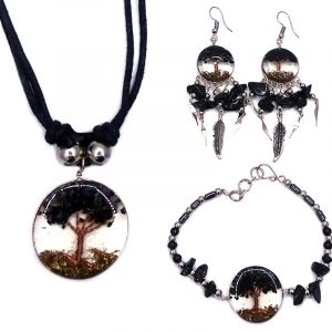 Handmade hematite, chip stone, and silver metal seed bead bracelet with round-shaped clear acrylic resin, copper wire, and crushed chip stone inlay tree of life centerpiece, a matching necklace, and matching feather charm dangle earrings in black onyx.