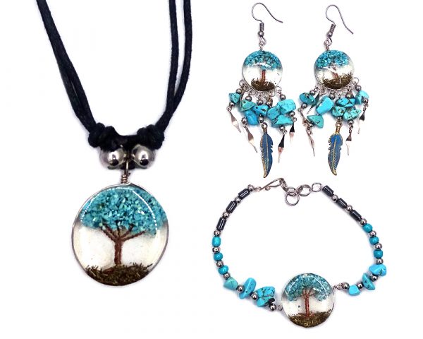 Handmade hematite, chip stone, and silver metal seed bead bracelet with round-shaped clear acrylic resin, copper wire, and crushed chip stone inlay tree of life centerpiece, a matching necklace, and matching feather charm dangle earrings in turquoise howlilte.