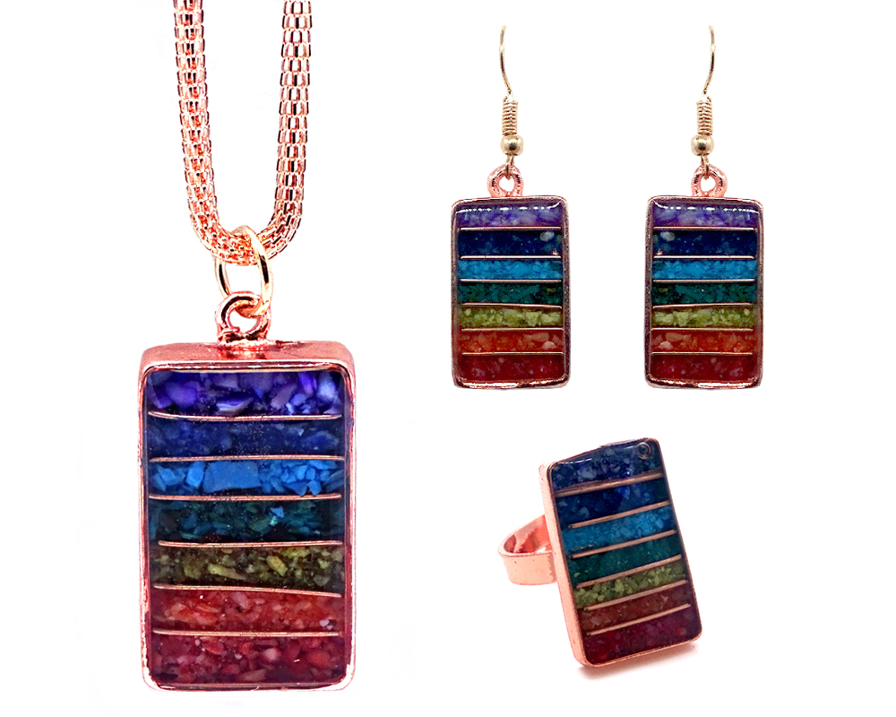 Rectangle-shaped acrylic resin, copper wire, and crushed chip stone inlay orgonite necklace, matching earrings, and matching ring with 7 chakra rainbow striped pattern and copper metal setting.