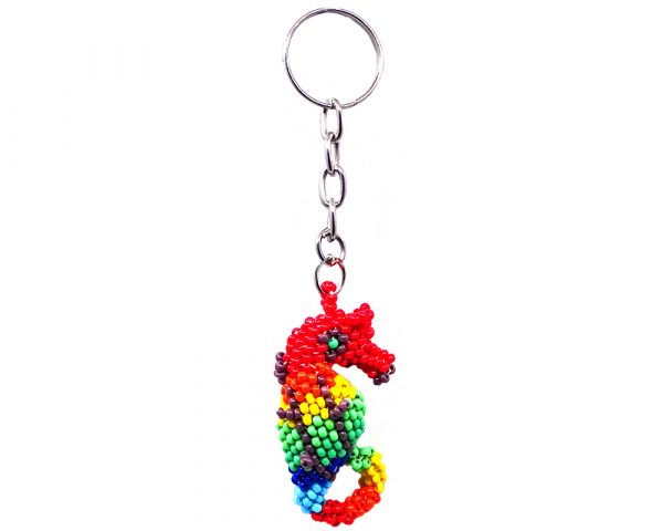 Handmade Czech glass seed bead figurine keychain of a seahorse in rainbow colors.