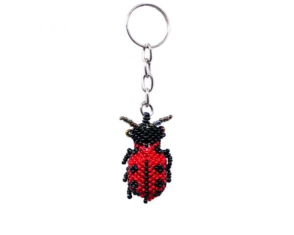 Handmade Czech glass seed bead figurine keychain of a ladybug in red and black color combination.