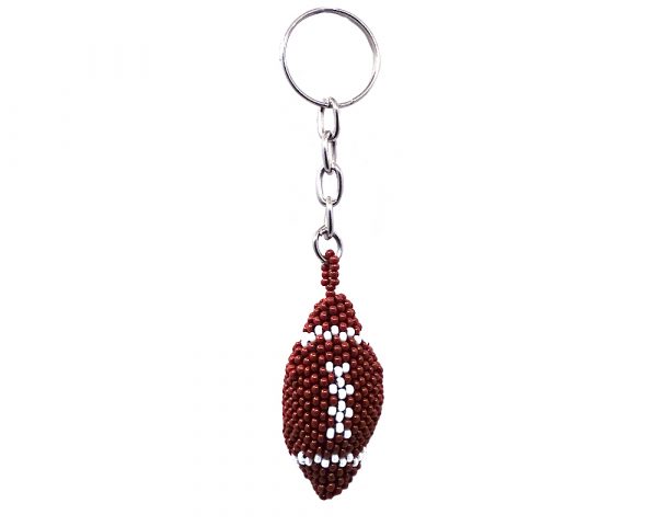 Handmade Czech glass seed bead figurine keychain of a football ball in brown and white color combination.