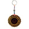 Handmade durepox resin figurine keychain of a sunflower in yellow and brown color combination.