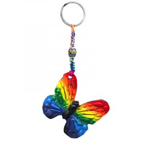Handmade durepox resin figurine keychain of a butterfly in rainbow colors.
