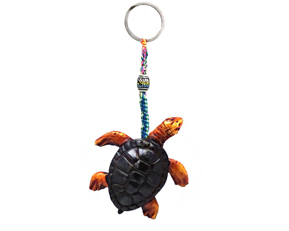 Handmade durepox resin figurine keychain of a sea turtle.