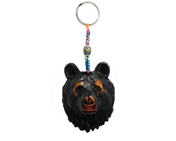 Handmade durepox resin figurine keychain of a black bear head.