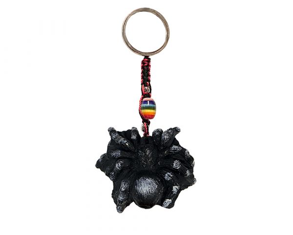 Handmade durepox resin figurine keychain of a black and gray tarantula spider.