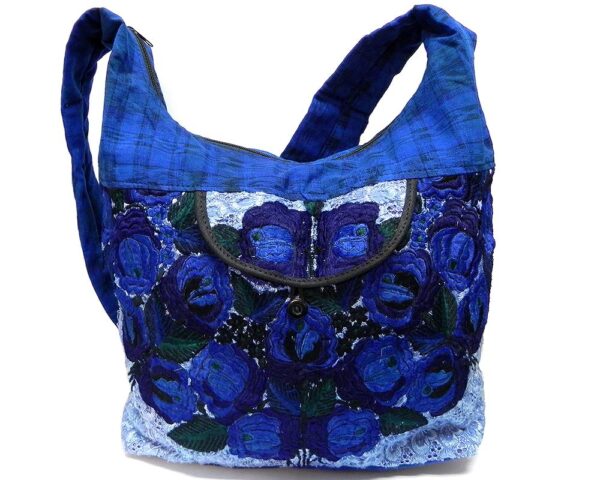 Handmade large floral purse bag with embroidered cotton, plaid fabric, zipper closure, outer pocket, and strap in blue color combination.