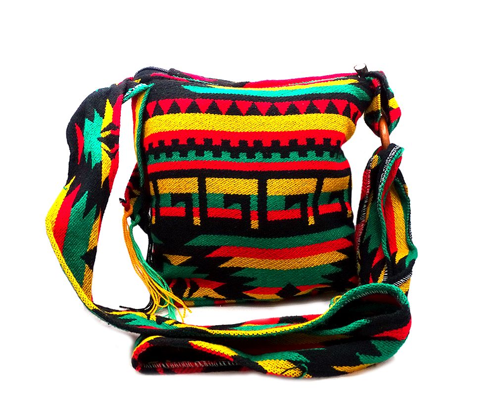 Handmade medium-sized cushioned square-shaped purse bag with Aztec inspired tribal print pattern and fringe flap in Rasta colors.