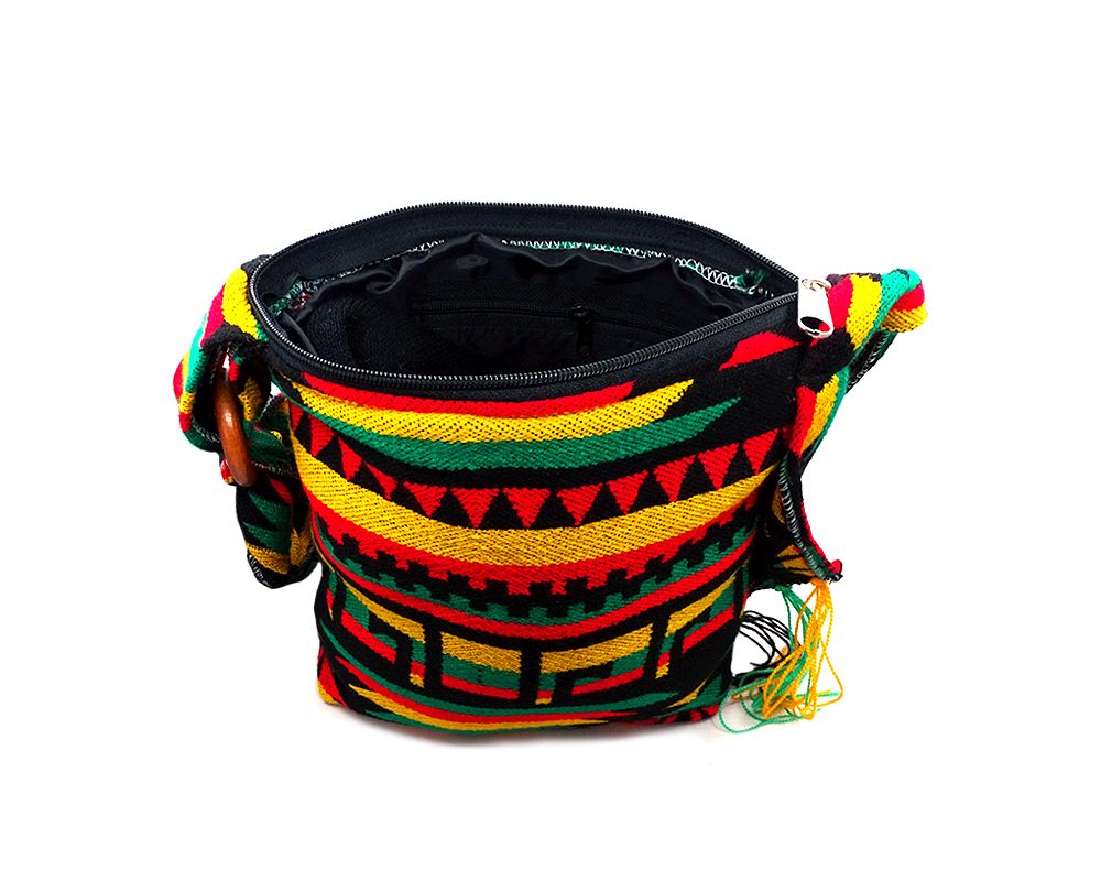 Handmade medium-sized cushioned square-shaped purse bag with Aztec inspired tribal print pattern and fringe flap in Rasta colors.
