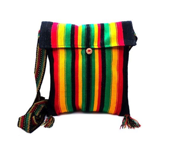 Medium-sized slim square-shaped purse bag with multicolored striped print pattern material and fringe in Rasta colors.