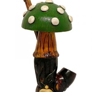 Handcrafted medium-sized tobacco smoking hand pipe of a big Amanita magic mushroom with white spots in green color.