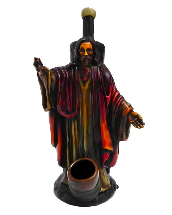 Handcrafted medium-sized tobacco smoking hand pipe of Jesus Christ wearing red and brown robes and holding up a peace sign.