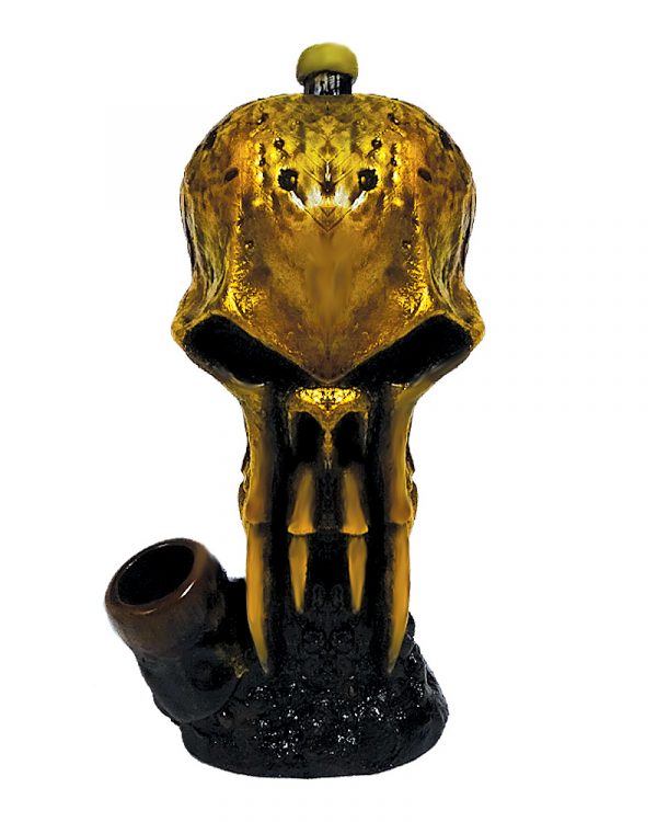 Handcrafted medium sized hand pipe of a gold skull with fangs.