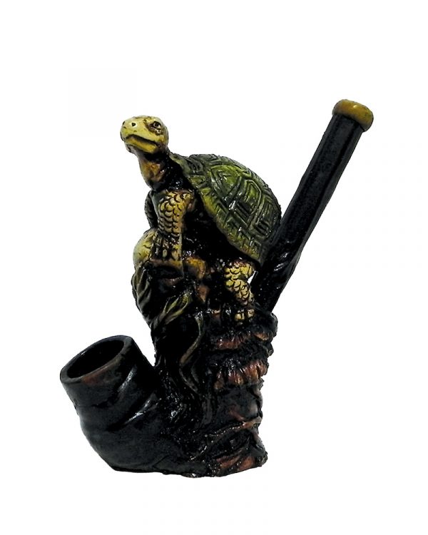 Handcrafted medium-sized tobacco smoking hand pipe of a perched turtle on a rock.