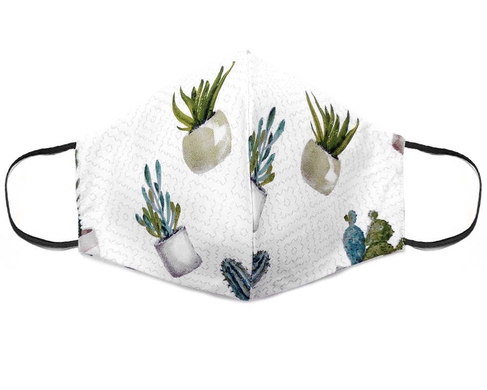 Handmade succulent plant print fabric face mask with 100% cotton and elastic straps in white and olive green adult size.